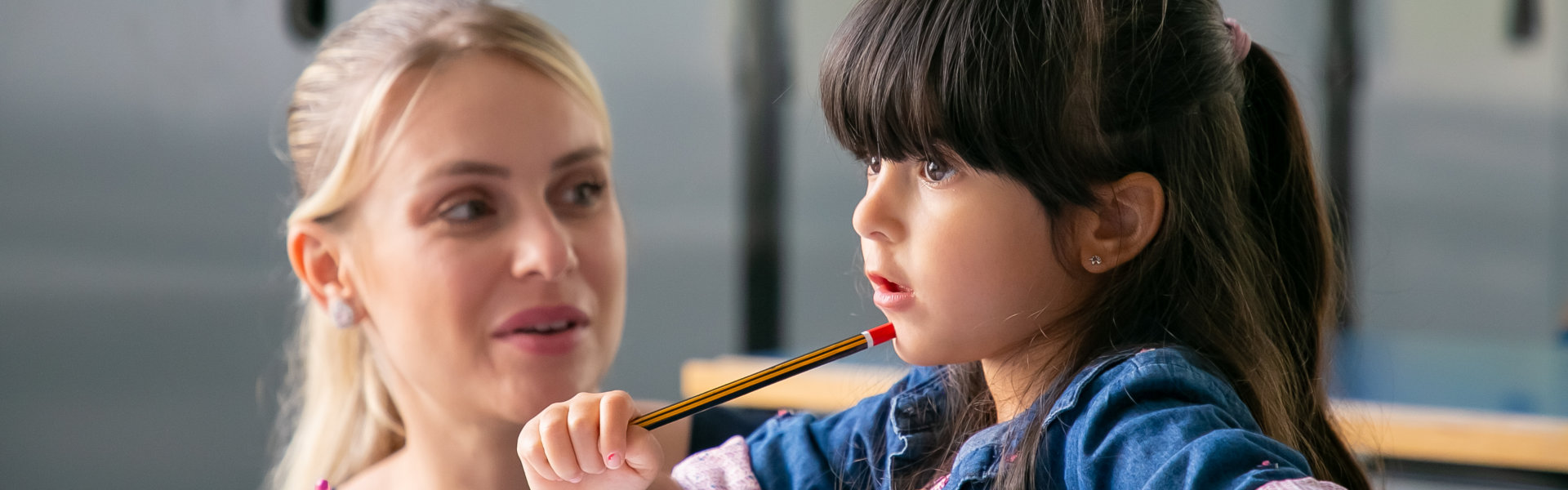 woman looking at the little girl