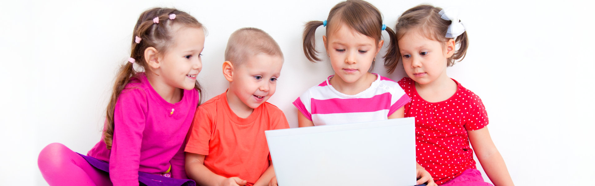 group of kids watching on the laptop